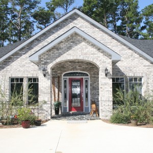 Sandmark custom remodel. Photo of front exterior of a custom home