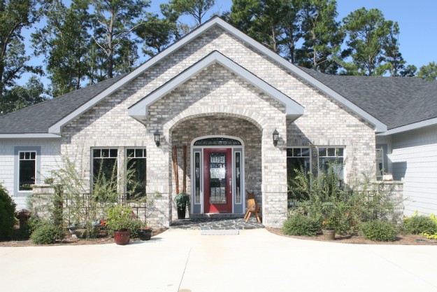 Sandmark custom remodel. Photo of front exterior of a custom home